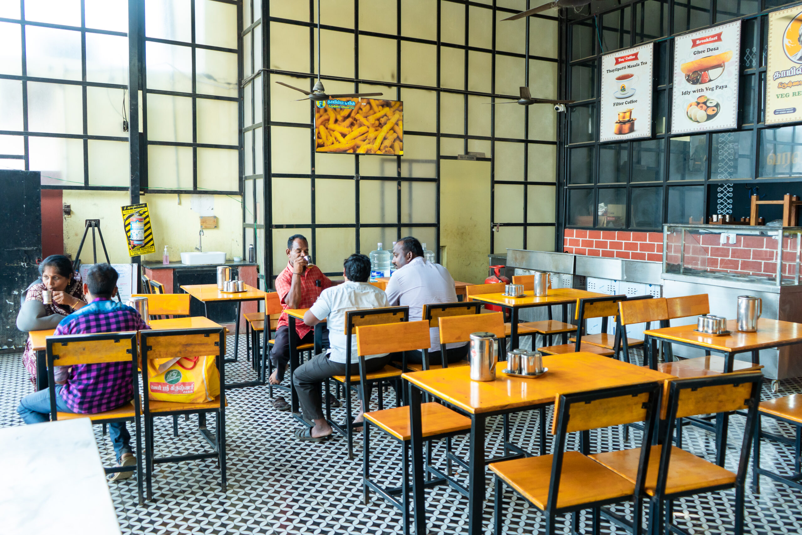 DOOH advertising display at Thayilpatti Krishna cafe Mangadu Chennai