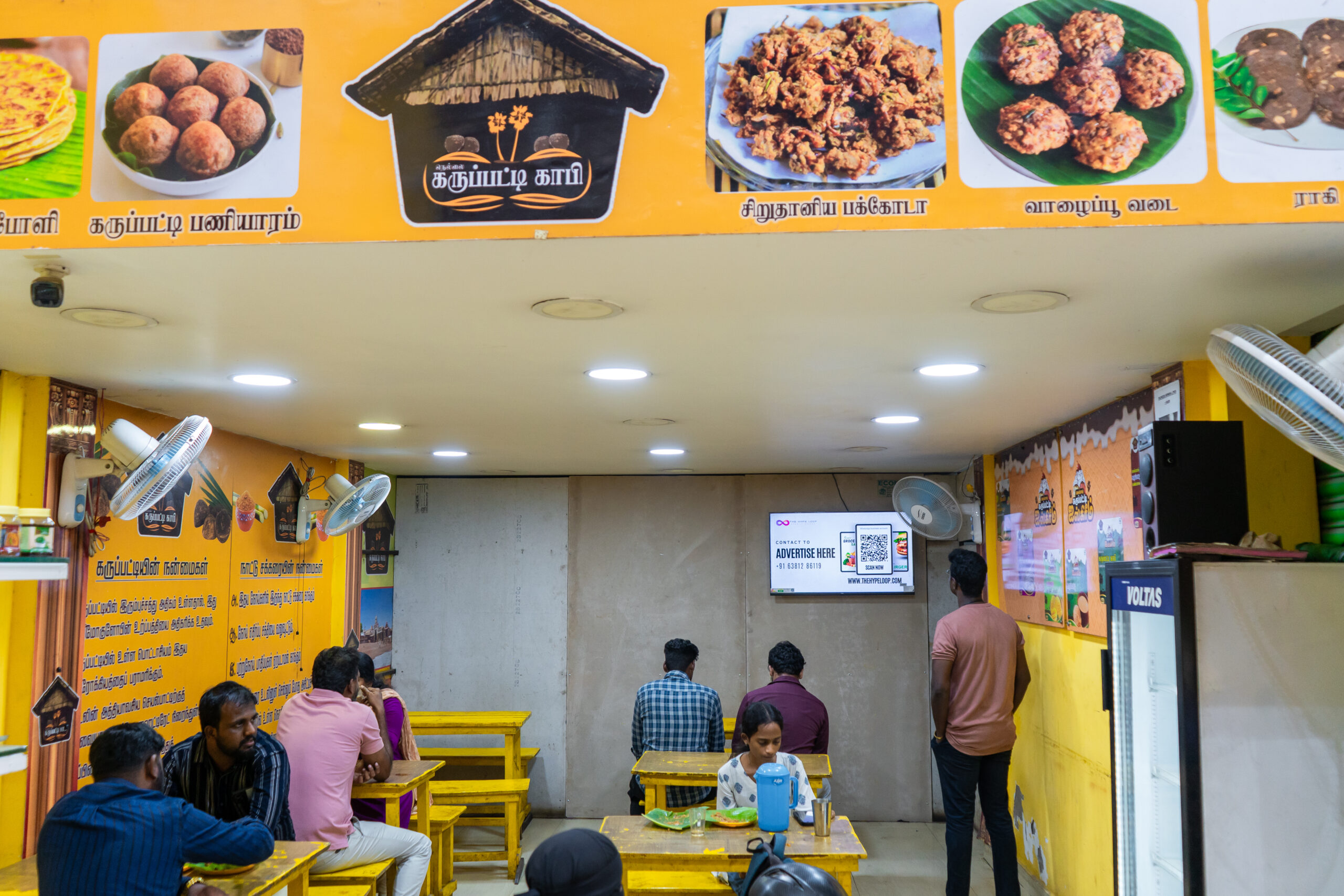 DOOH screen at Nellai Karupatti Coffee Thirumazhisai Chennai